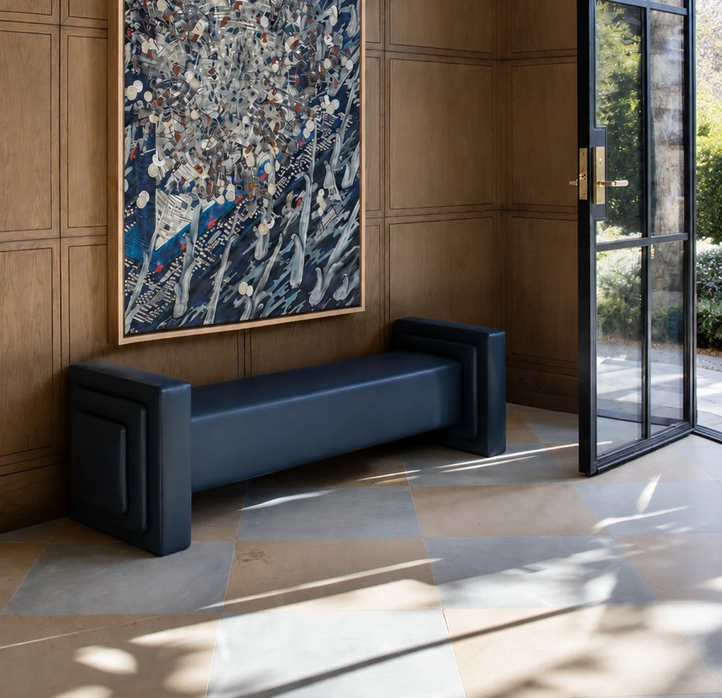 Christopher Todd Living upholstered bench in a paneled entry
