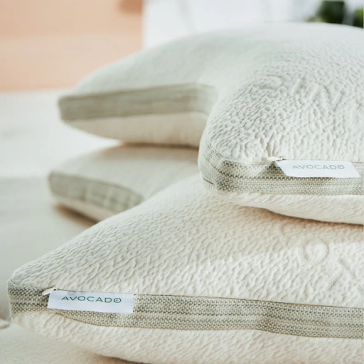 The Avocado Green Pillow is made with organic latex and wool, offering breathable support for back sleepers