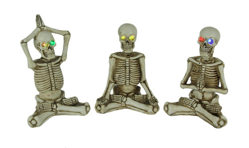 Bone Stretchers Yoga Skeleton Figurines with Color Changing LED Eyes Set of 3 Main image