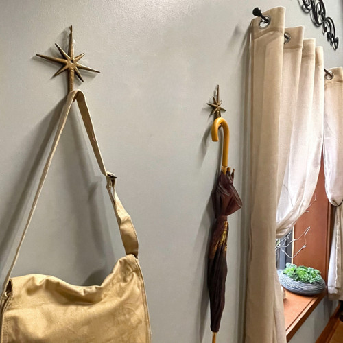 Set of 2 Gold Finish Cast Iron 8-Pointed Atomic Starburst Wall Hooks Main image
