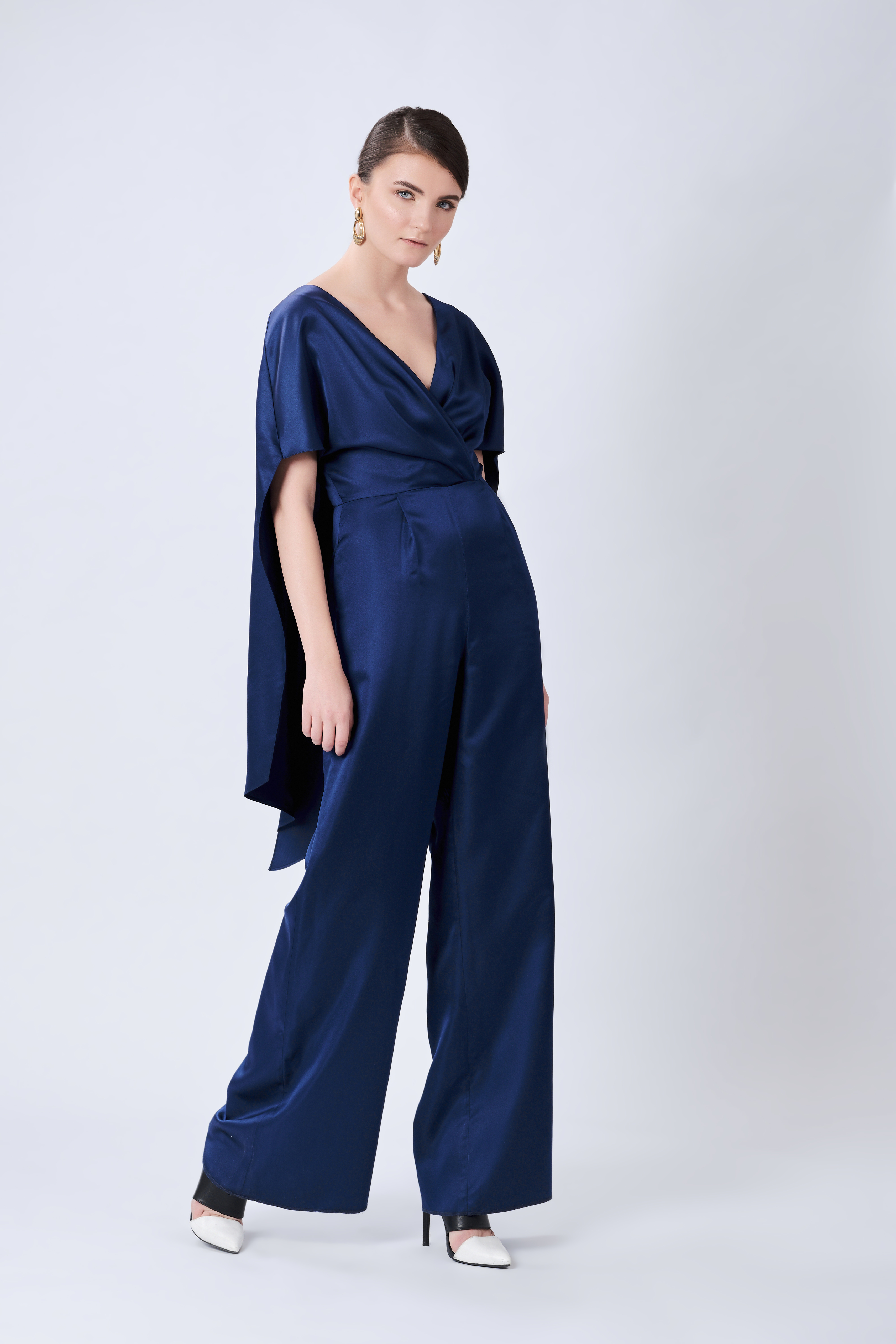 blue jumpsuit with cape