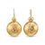 Gold-plated hammered disc earrings with delicate moissanite, featuring a round statement design and textured finish.
