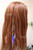 Accesorio pluma clip color Roja
