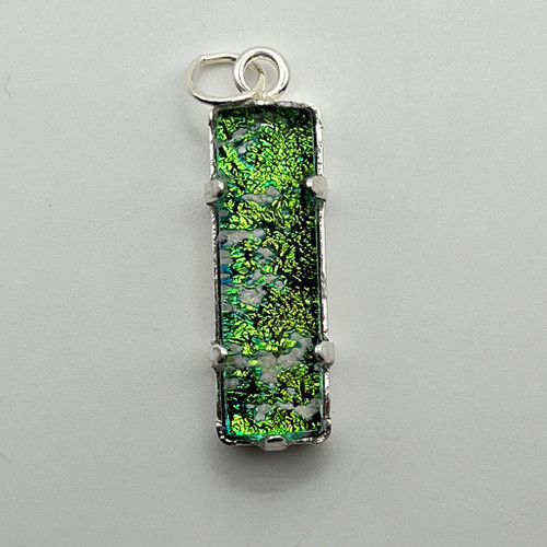 elegantly designed cremation pendant is exquisitely crafted of dichroic glass and silverplate setting