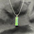 elegantly designed cremation pendant is exquisitely crafted of dichroic glass and silverplate setting