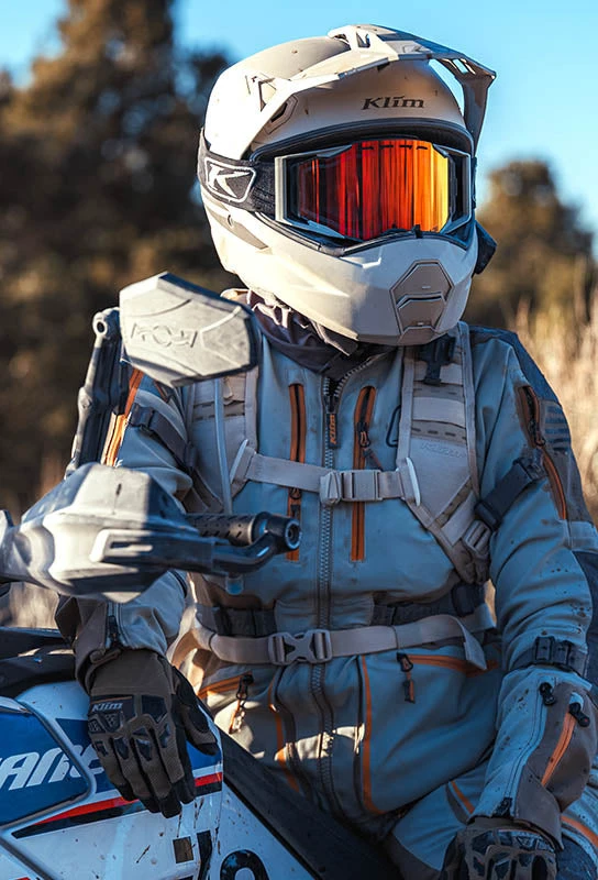 Klim motorcycle rider wearing gray riding gear