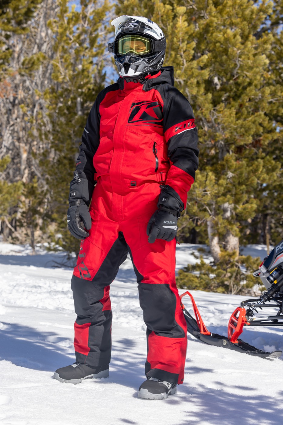 Klim rider wearing red and black snow outerwear