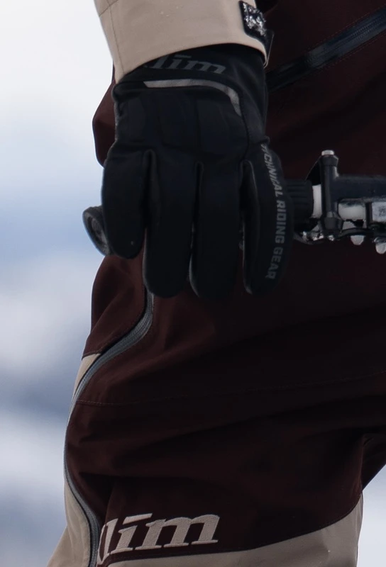 Klim snowmobile glove on a handlebar