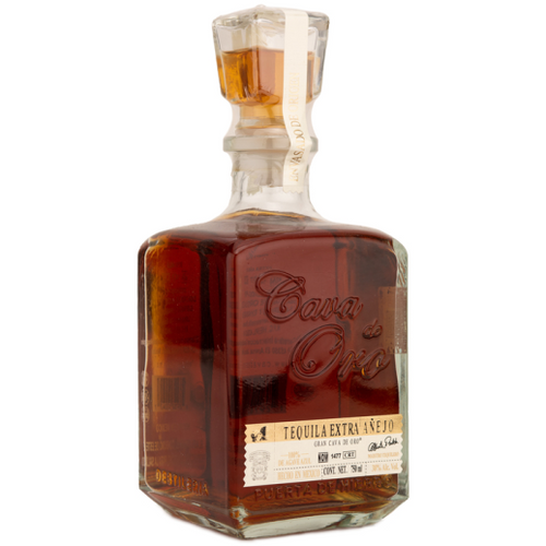 Buy Cava De Oro Extra Anejo Tequila online at sudsandspirits.com and have it shipped to your door nationwide.