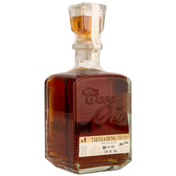 Buy Cava De Oro Extra Anejo Tequila online at sudsandspirits.com and have it shipped to your door nationwide.