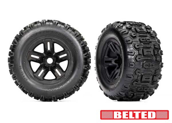 TRA9573 TRAXXAS Tires & Wheels, Assembled, Glued (3.8" Black Wheels, Belted Sledgehammer Tires, Foam Inserts) (2)