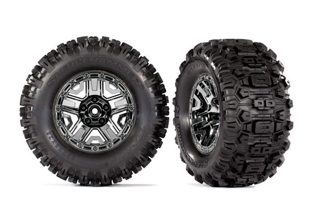TRA9072 TRAXXAS Tires & wheels, assembled, glued (black chrome 2.8" wheels, Sledgehammer™ tires, foam inserts) (2) (TSM® rated)