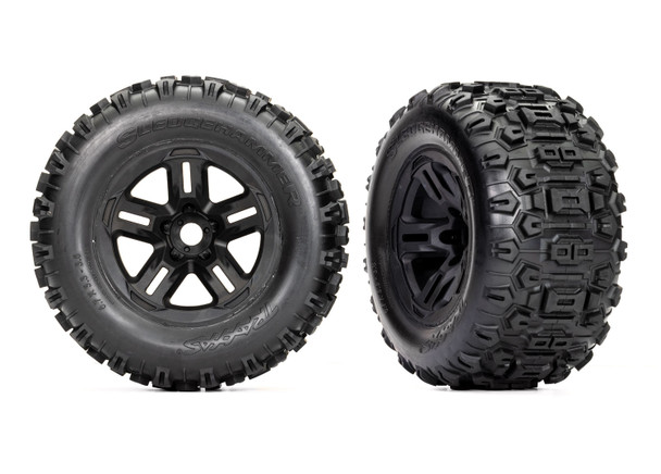 TRA9672 TRAXXAS Sledge Tires and wheels, assembled, glued (3.8" black wheels, Sledgehammer® tires, foam inserts) (2)