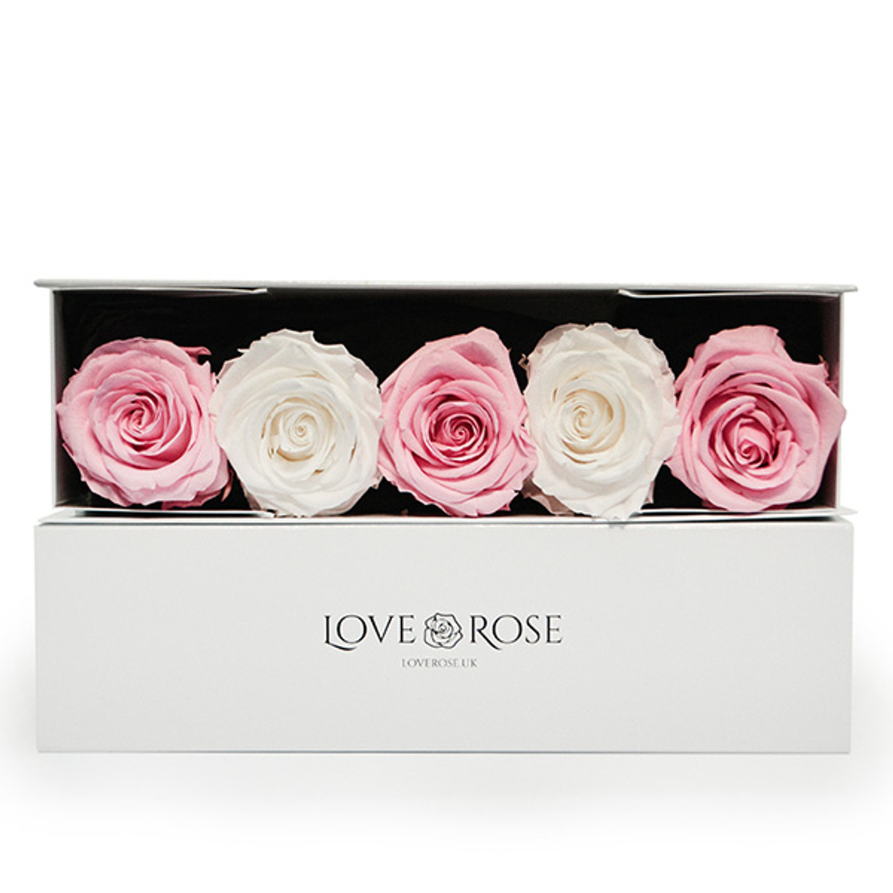 A box of pink and white luxury roses