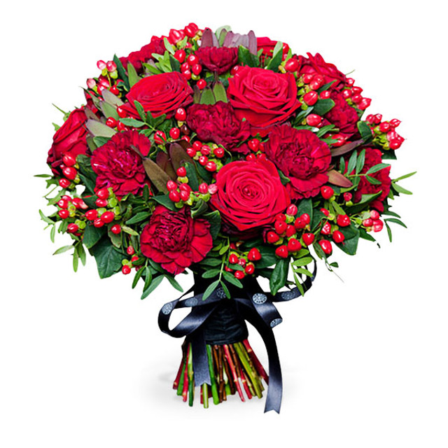 Luxurious red roses, Hypericum berries and assorted foliage