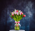 Hand-picked but our florists and put together in pastel, pink and red tones, this bunch of tulips comes with a free clear glass vase ready to display this blooms at their best.