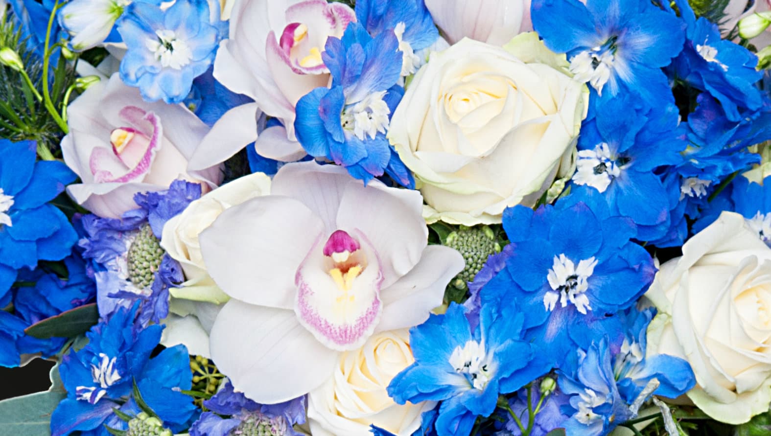 classic blue and white funeral posy