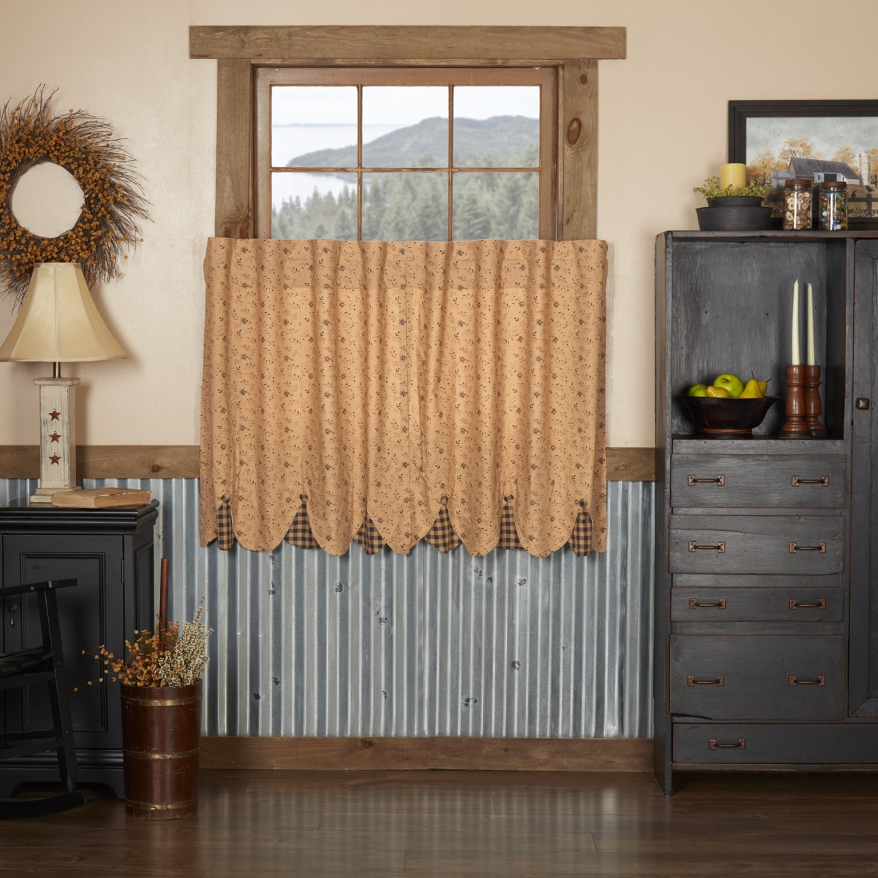 Window with tan floral tier curtains