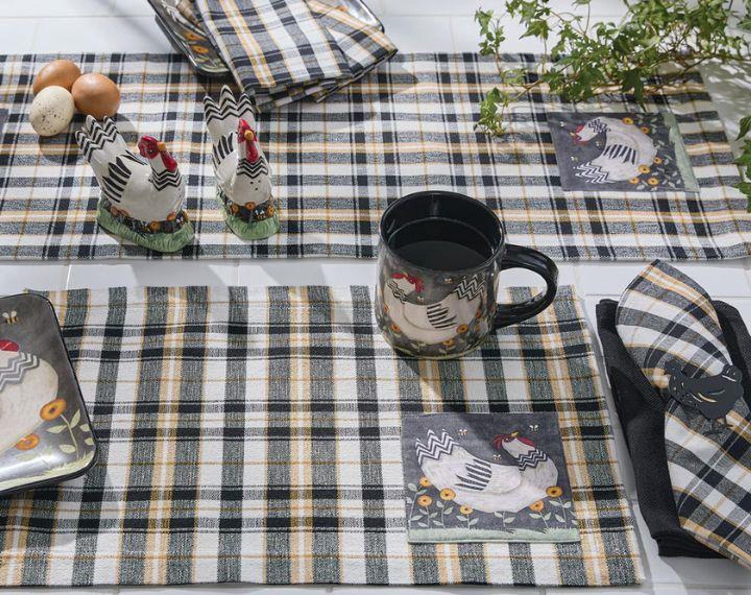 black and yellow plaid table linens with chicken accents