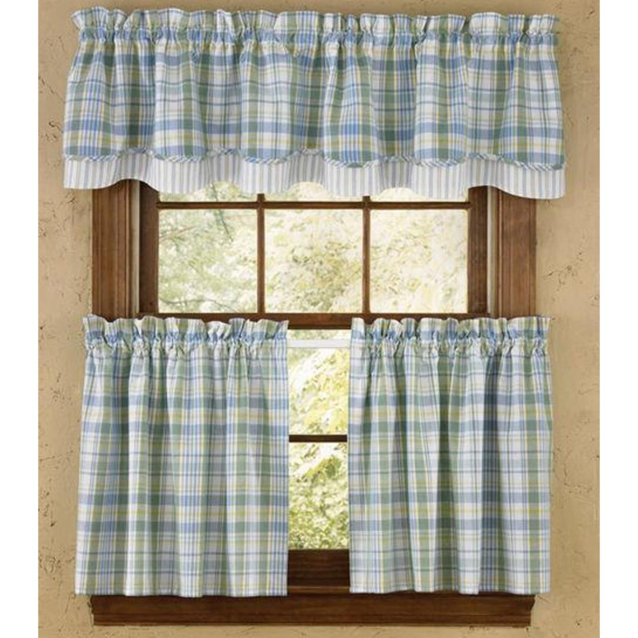 Window styled with blue and green plaid curtains
