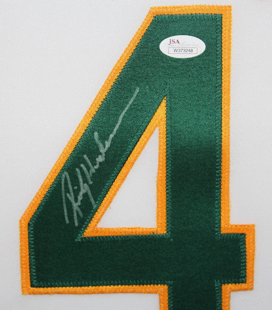 Rickey Henderson Autographed and Framed White Athletics Jersey
