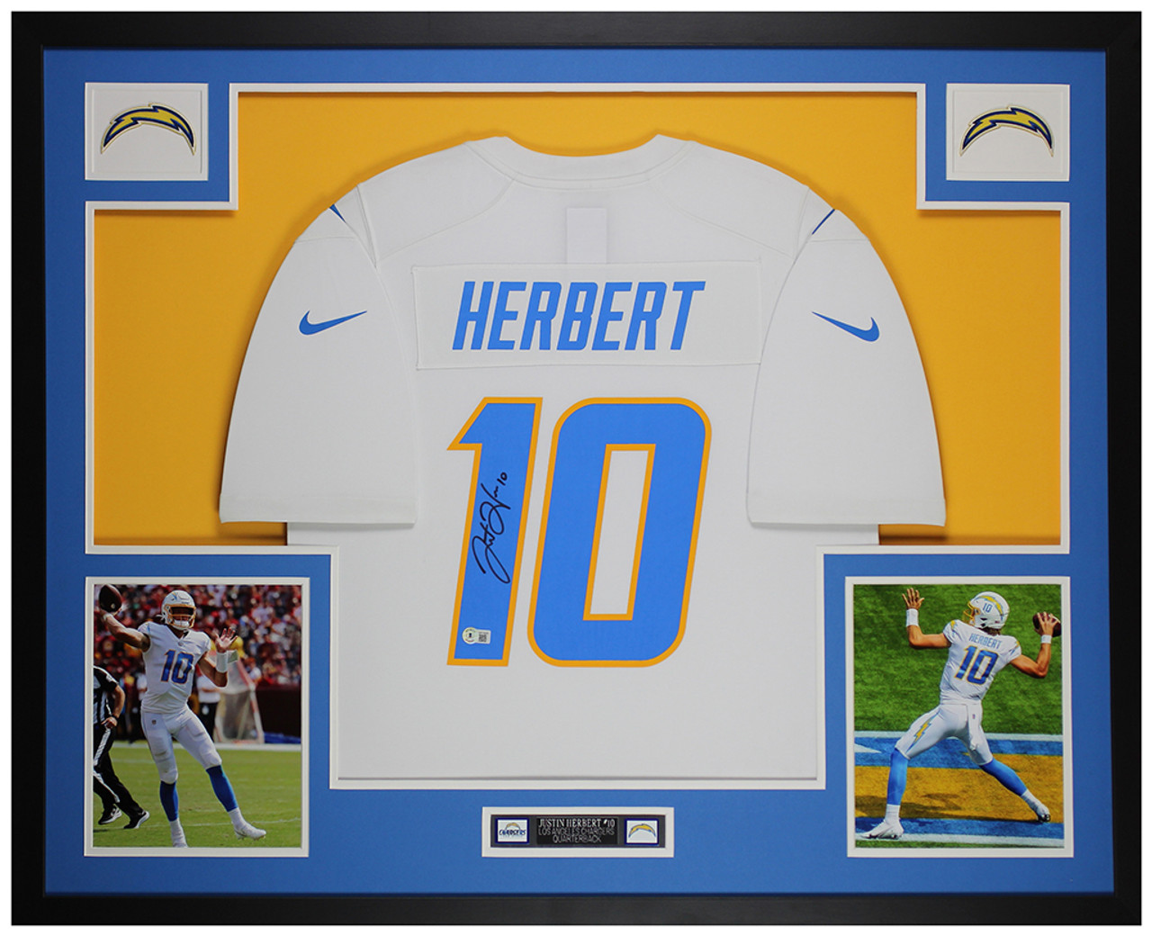 Justin Herbert Los Angeles Chargers Unsigned White Jersey Spotlight Photograph