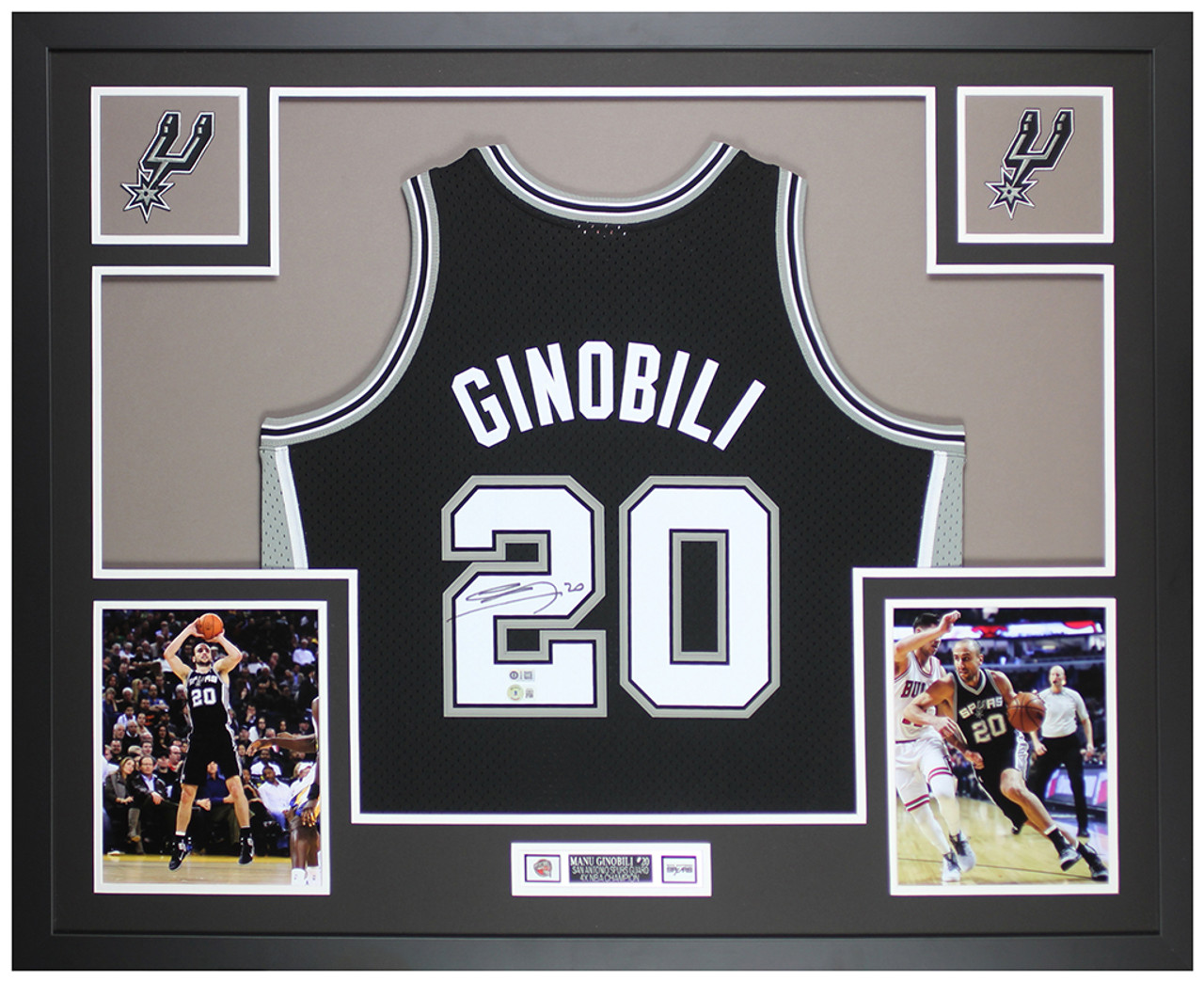 Emanuel Ginobili of the San Antonio Spurs draws contact on his way to