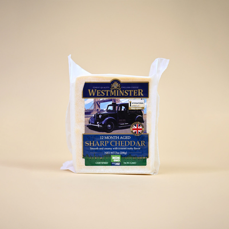 7 OUNCE OF WESTMINSTER CHEDDAR SHARP.

A WELL-BALANCED CHEESE WITH A TANGY ROUNDED BITE, OUR NON-GMO SHARP CHEDDAR IS AGED FOR OVER TWELVE MONTHS AND FEATURES A SMOOTH CREAMY TEXTURE AND MOUTH-WATERING DEPTH OF TASTE, MAKING IT THE PERFECT ENTRY LEVEL CHEDDAR!

WITH OUR NON-GMO SHARP CHEDDAR, THE POSSIBILITIES ARE ENDLESS! PAIR THE CHEESE WITH A DOSE OF FLAVORSOME COURSE GRAIN MUSTARD, PLACE ON TOP OF A SLICE OF FRESHLY BAKED GRANARY BREAD AND ENJOY THAT ABSOLUTELY HEAVENLY TASTE.

NON GMO