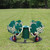 four seat infant carousel in green and beige