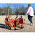 four seat infant carousel in red and yellow with kids
