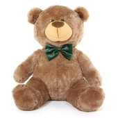 He is a cheerful Christmas teddy bear with mocha brown fur and a smile that will melt snow!