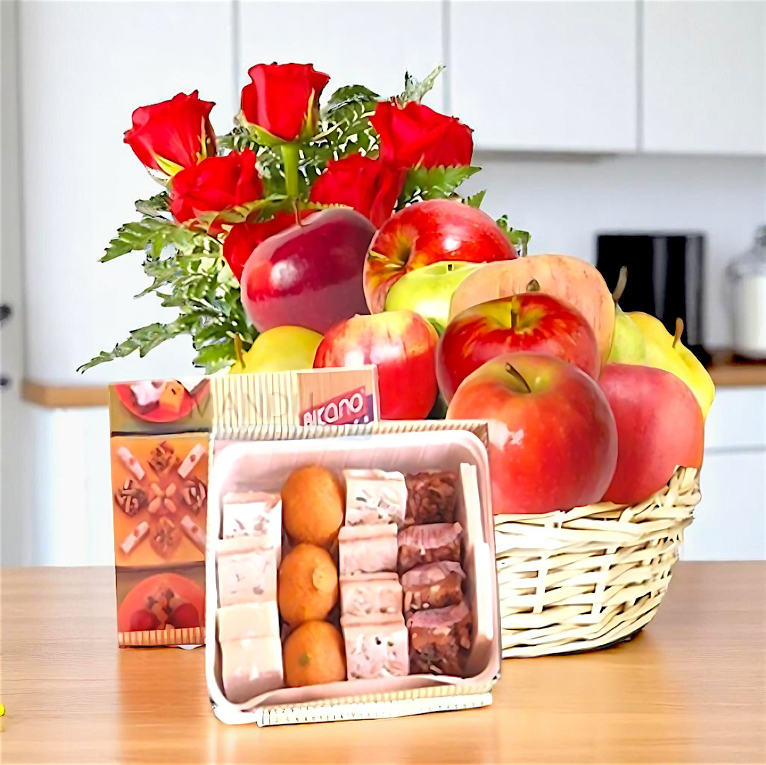 Delightful treat with Sweets box with Fruits and Flowers