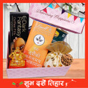 Sweets, Chocolates and Almonds with a Ganesh Statue