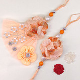 Orange Net Floral Lumba Rakhi Set Bhaiya Bhabhi Rakhi