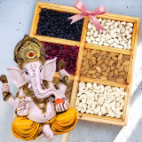 Ganesh Ji Statue With Dry Nuts in a Wooden Tray