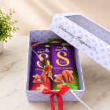 Beautiful Rakhi with Dairy Milk Chocolates In A Gift Box