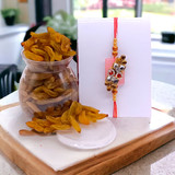 Kismis Jar With Rakhi Thread Combo (Rakhi Thread May Vary) Kismis Jar With Rakhi Thread Combo (Rakhi Thread May Vary)