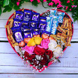 Stunning Roses With Chocolates Bouquet in Heart Box