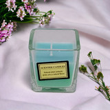 A Cream Scented Candle With a Creamy Aroma