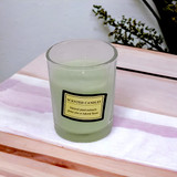 A Gentle Light Green Candle With a Delightful Aroma