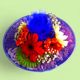 Decor Of Flowers With Dry Nuts & Sunflower Candle