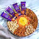 Dry Nuts Decor With Dairy Milk Chocolates In A Tray