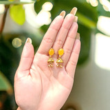 Yellow Stone with Golden Jhumka Earrings