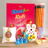 Return Gift for Sister: Pencils, Chocolates, Hair Clip and Rakhi Return Gift for Sister: Pencils, Chocolates, Hair Clip and Rakhi