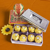 Lord Ganesh Statue with Premium Chocolates and Sunflower