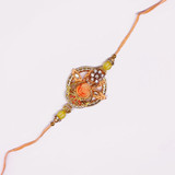 Orange Color Beautiful Rakhi with Rose Design Orange Color Beautiful Rakhi with Rose Design