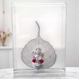 Silver Ganesh Idol Sitting on Beautiful Silver Peepal Leaf Giftmandu Silver Ganesh Idol Sitting on Beautiful Silver Peepal Leaf Giftmandu