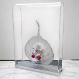 Silver Ganesh Idol Sitting on Beautiful Silver Peepal Leaf Giftmandu Silver Ganesh Idol Sitting on Beautiful Silver Peepal Leaf Giftmandu