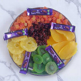 Dry Fruits With Chocolates in a Plate