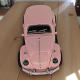 Pink Volkswagen Beetle Car